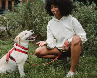 Girl with dog on lead